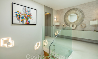 Charming, modern luxury villa for sale in a prestigious beachside community on the Golden Mile of Marbella 43280 