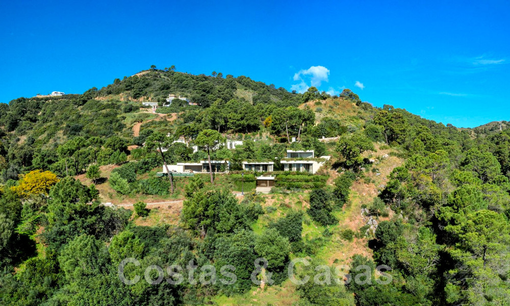 New on the market! Innovative designer villa for sale, completely nestled in the surrounded nature, with stunning panoramic views, in Benahavis - Marbella 43348