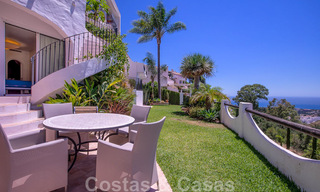 Contemporary renovated townhouse for sale in a charming white Andalucian-style urbanization with open sea views in East Marbella 43535 