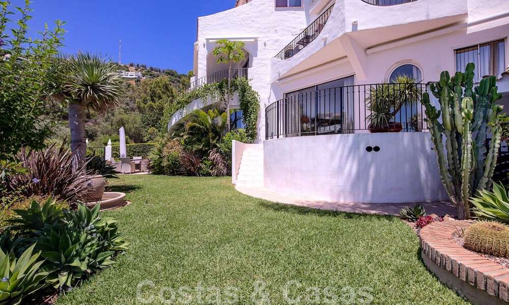Contemporary renovated townhouse for sale in a charming white Andalucian-style urbanization with open sea views in East Marbella 43536
