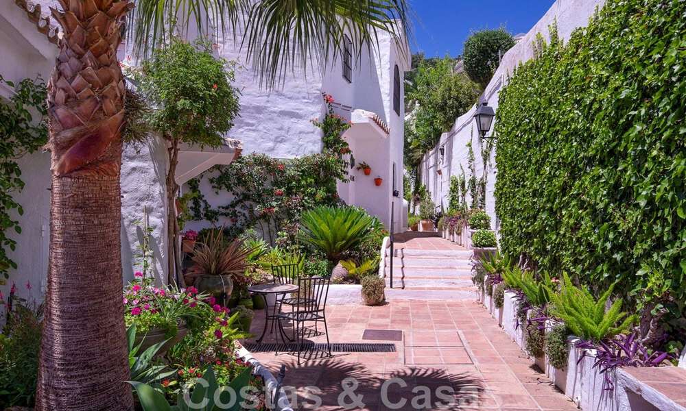 Contemporary renovated townhouse for sale in a charming white Andalucian-style urbanization with open sea views in East Marbella 43539