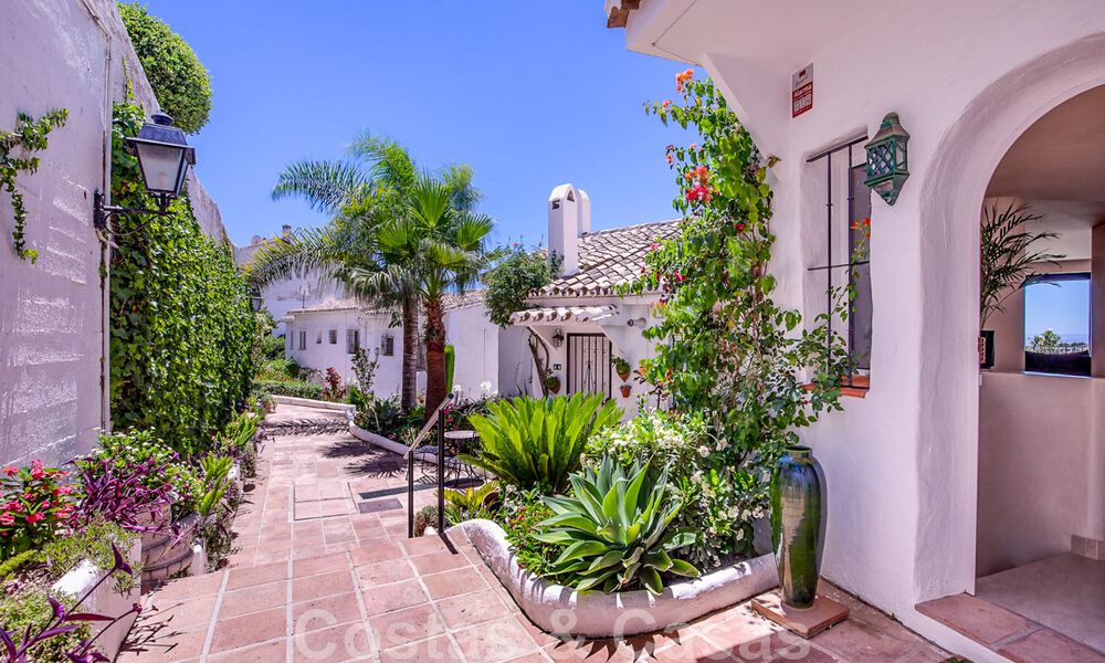 Contemporary renovated townhouse for sale in a charming white Andalucian-style urbanization with open sea views in East Marbella 43553