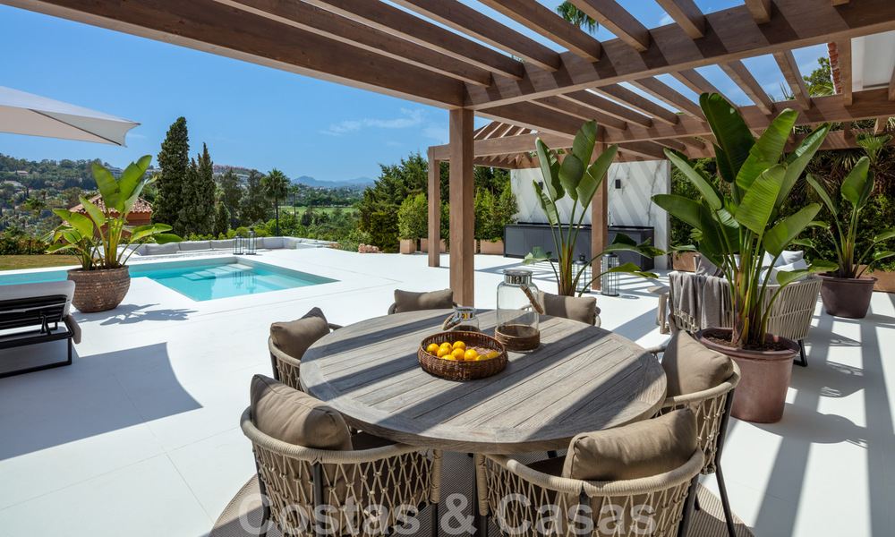 Contemporary Andalusian luxury villa for sale with numerous luxury amenities, surrounded by golf courses in Nueva Andalucia, Marbella 44353