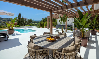 Contemporary Andalusian luxury villa for sale with numerous luxury amenities, surrounded by golf courses in Nueva Andalucia, Marbella 44353 