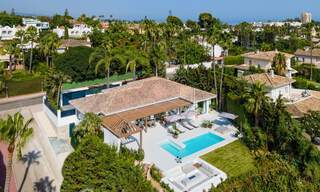 Contemporary Andalusian luxury villa for sale with numerous luxury amenities, surrounded by golf courses in Nueva Andalucia, Marbella 44368 