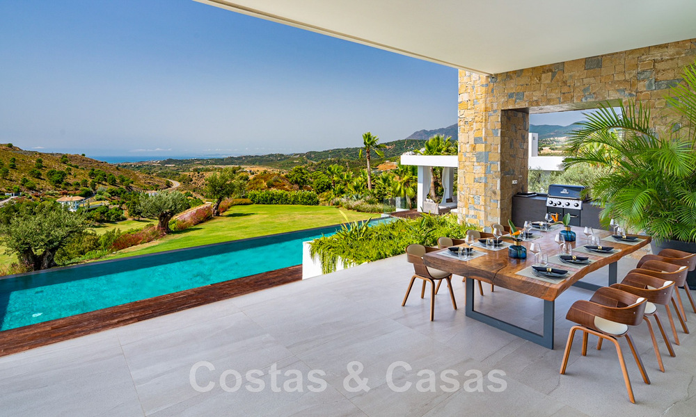 Phenomenal contemporary luxury villa for sale, directly next to the golf course with sea views in a gated golf resort in Marbella - Benahavis 43970