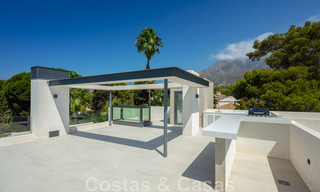 Impressive, modern luxury villa with stunning sea views for sale in a desirable urbanisation on the Golden Mile of Marbella 44524 