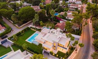 Impressive, modern luxury villa with stunning sea views for sale in a desirable urbanisation on the Golden Mile of Marbella 44551 
