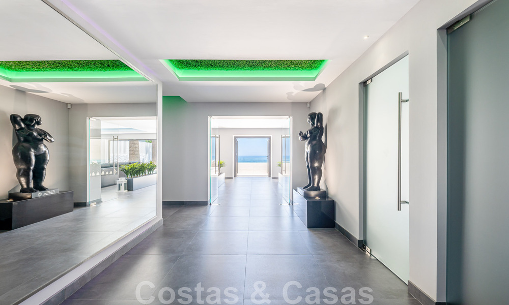 Avant-garde beach villa in a sleek modern style for sale, frontline beach in Mijas Costa, Costa del Sol 44413