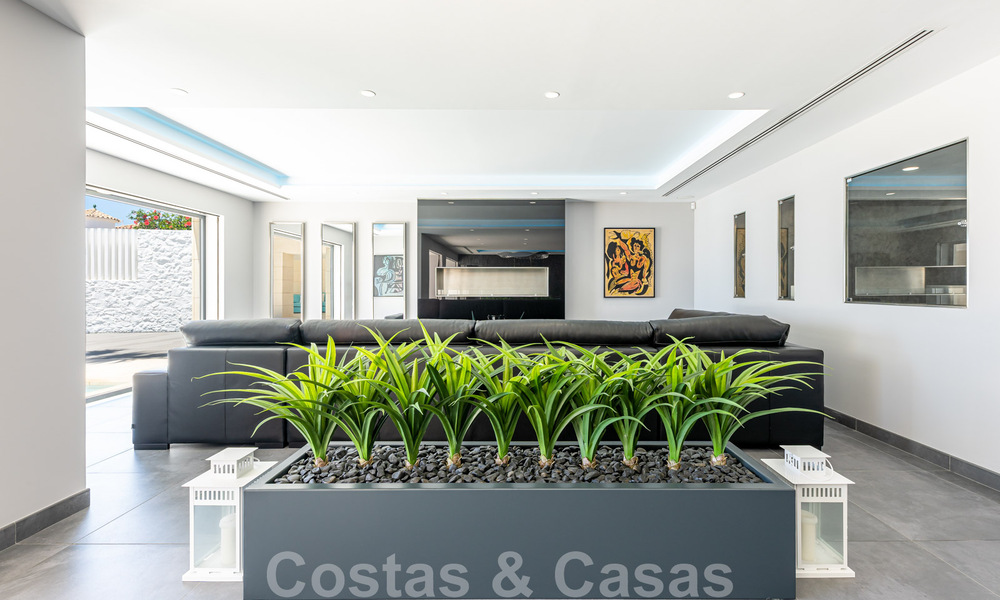 Avant-garde beach villa in a sleek modern style for sale, frontline beach in Mijas Costa, Costa del Sol 44415