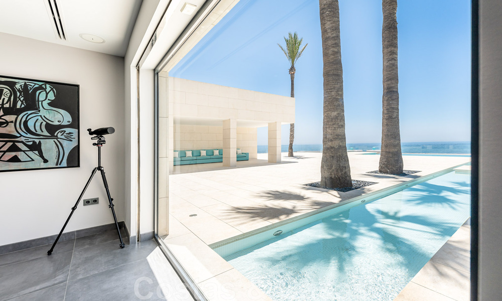 Avant-garde beach villa in a sleek modern style for sale, frontline beach in Mijas Costa, Costa del Sol 44417