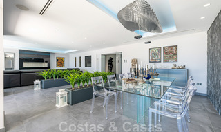 Avant-garde beach villa in a sleek modern style for sale, frontline beach in Mijas Costa, Costa del Sol 44419 