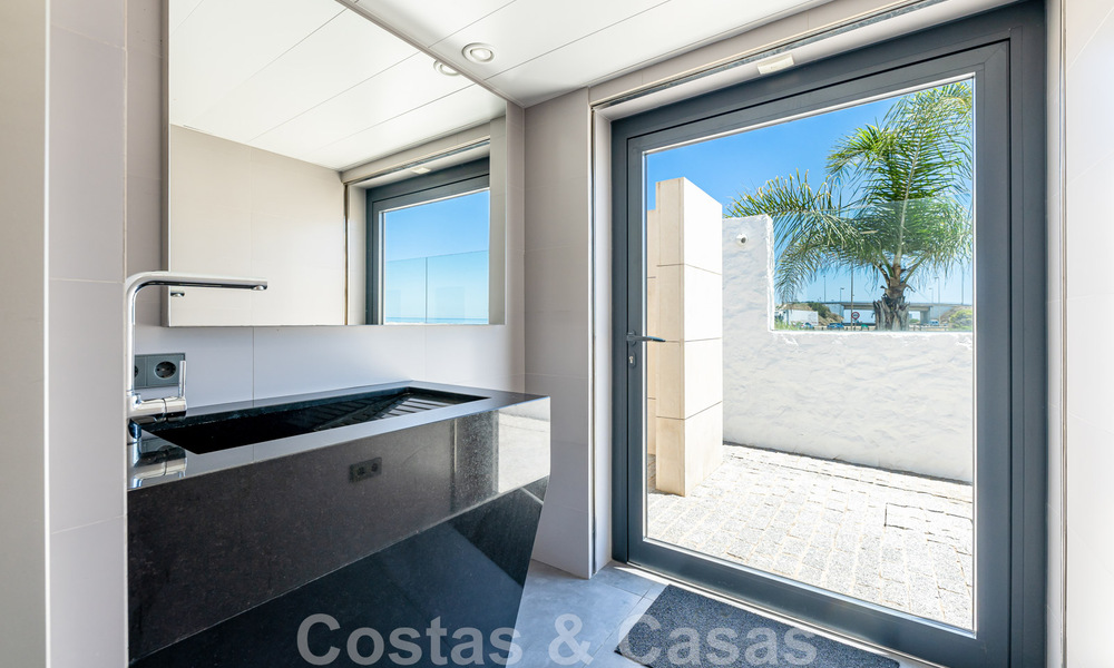 Avant-garde beach villa in a sleek modern style for sale, frontline beach in Mijas Costa, Costa del Sol 44425