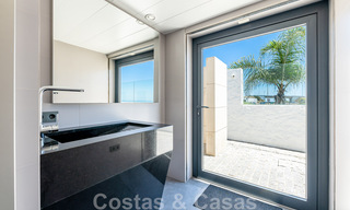 Avant-garde beach villa in a sleek modern style for sale, frontline beach in Mijas Costa, Costa del Sol 44425 