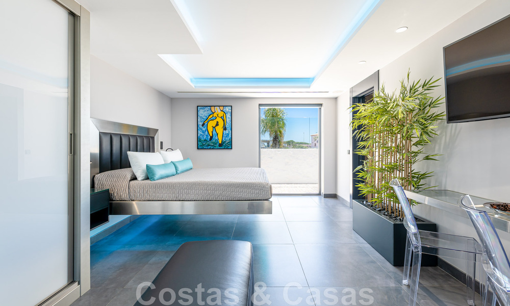 Avant-garde beach villa in a sleek modern style for sale, frontline beach in Mijas Costa, Costa del Sol 44426