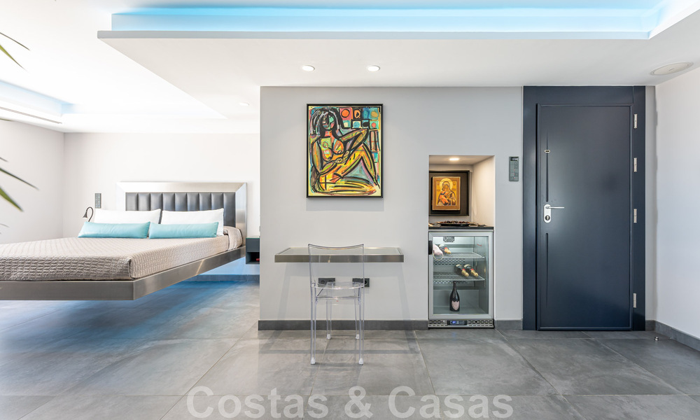 Avant-garde beach villa in a sleek modern style for sale, frontline beach in Mijas Costa, Costa del Sol 44433
