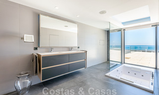 Avant-garde beach villa in a sleek modern style for sale, frontline beach in Mijas Costa, Costa del Sol 44434 