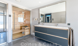 Avant-garde beach villa in a sleek modern style for sale, frontline beach in Mijas Costa, Costa del Sol 44435 