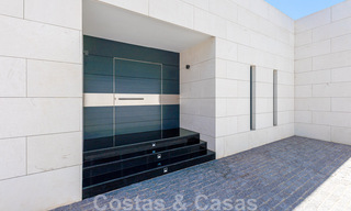 Avant-garde beach villa in a sleek modern style for sale, frontline beach in Mijas Costa, Costa del Sol 44449 