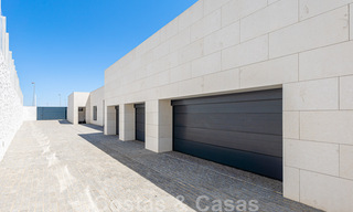 Avant-garde beach villa in a sleek modern style for sale, frontline beach in Mijas Costa, Costa del Sol 44450 