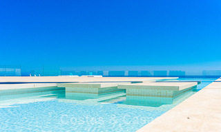Avant-garde beach villa in a sleek modern style for sale, frontline beach in Mijas Costa, Costa del Sol 44455 