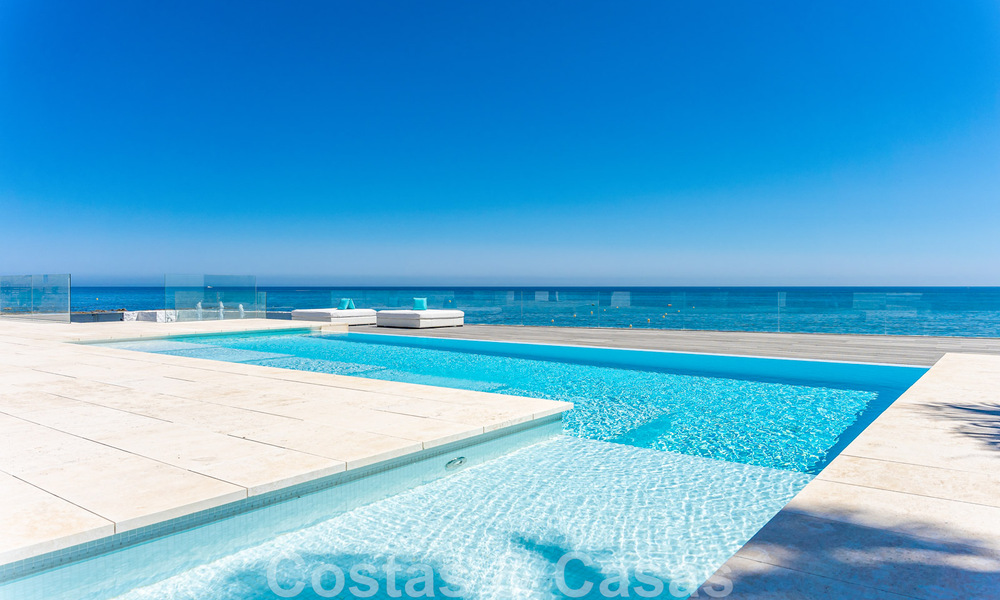 Avant-garde beach villa in a sleek modern style for sale, frontline beach in Mijas Costa, Costa del Sol 44456