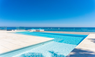 Avant-garde beach villa in a sleek modern style for sale, frontline beach in Mijas Costa, Costa del Sol 44456 