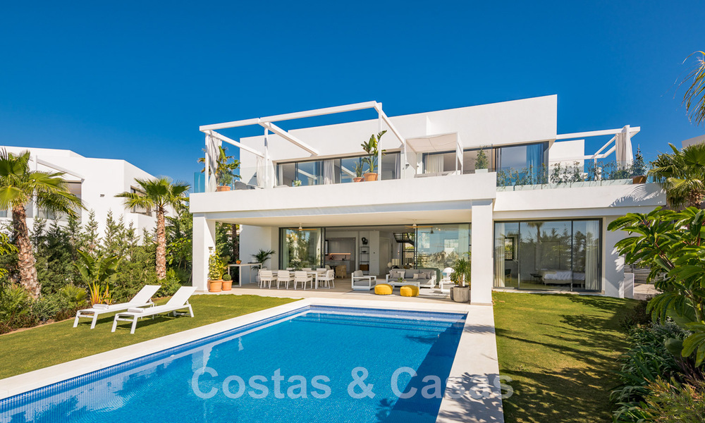 Turnkey, modern villa for sale, frontline golf with stunning sea views in East Marbella. Ready to move in 44981