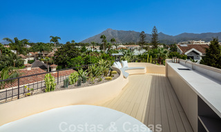 Andalusian, modernist villa for sale with panoramic views, beachside, on Marbella's Golden Mile 44912 