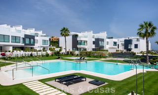 Move-in ready, modern townhouse with sea views for sale, right on the beach, a few minutes' walk from Estepona town 45385 