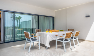 Move-in ready, modern townhouse with sea views for sale, right on the beach, a few minutes' walk from Estepona town 45392 
