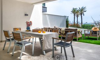 Move-in ready, modern townhouse with sea views for sale, right on the beach, a few minutes' walk from Estepona town 45393 