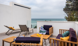 Move-in ready, modern townhouse with sea views for sale, right on the beach, a few minutes' walk from Estepona town 45418 