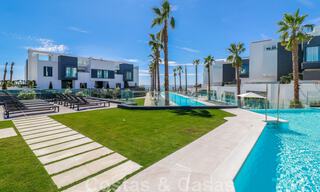 Move-in ready, modern townhouse with sea views for sale, right on the beach, a few minutes' walk from Estepona town 45431 