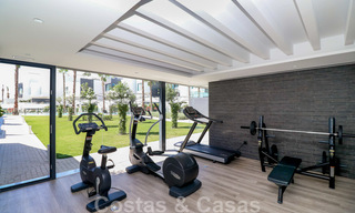 Move-in ready, modern townhouse with sea views for sale, right on the beach, a few minutes' walk from Estepona town 45432 