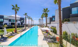 Move-in ready, modern townhouse with sea views for sale, right on the beach, a few minutes' walk from Estepona town 45435 