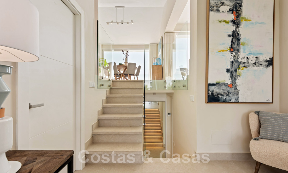 Contemporary, fully refurbished villa for sale, with open sea views located in a beachside urbanisation of Estepona 45020