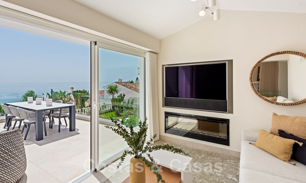 Contemporary, fully refurbished villa for sale, with open sea views located in a beachside urbanisation of Estepona 45061