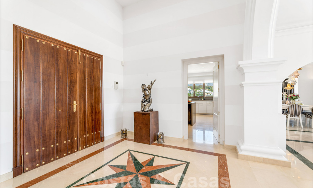 Spacious, detached luxury villa for sale, in Andalusian architectural style situated on a high position in the heart of Nueva Andalucia 45102