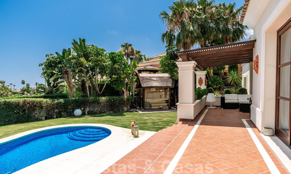 Spacious, detached luxury villa for sale, in Andalusian architectural style situated on a high position in the heart of Nueva Andalucia 45133