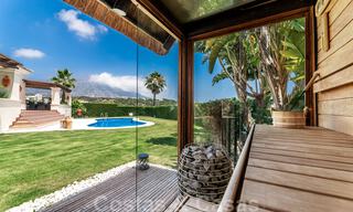 Spacious, detached luxury villa for sale, in Andalusian architectural style situated on a high position in the heart of Nueva Andalucia 45139 