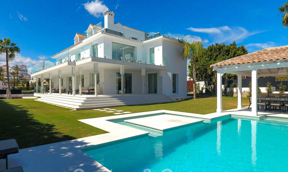 Unique luxury villa for sale in a modern, Andalusian architectural style, with sea views, within walking distance of Puerto Banus, Marbella 45840