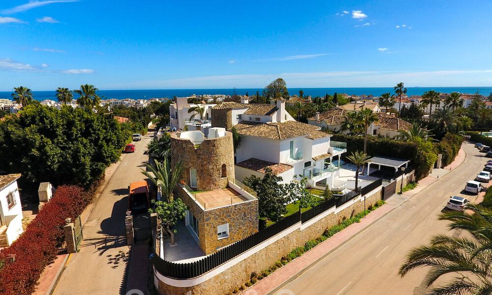 Unique luxury villa for sale in a modern, Andalusian architectural style, with sea views, within walking distance of Puerto Banus, Marbella 45841