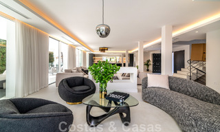 Unique luxury villa for sale in a modern, Andalusian architectural style, with sea views, within walking distance of Puerto Banus, Marbella 45869 