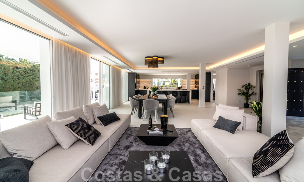 Unique luxury villa for sale in a modern, Andalusian architectural style, with sea views, within walking distance of Puerto Banus, Marbella 45870
