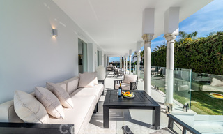 Unique luxury villa for sale in a modern, Andalusian architectural style, with sea views, within walking distance of Puerto Banus, Marbella 45877 