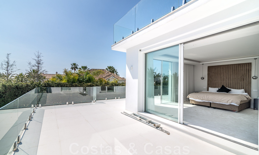 Unique luxury villa for sale in a modern, Andalusian architectural style, with sea views, within walking distance of Puerto Banus, Marbella 45886