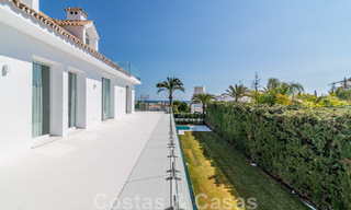 Unique luxury villa for sale in a modern, Andalusian architectural style, with sea views, within walking distance of Puerto Banus, Marbella 45887 