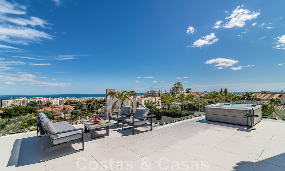 Unique luxury villa for sale in a modern, Andalusian architectural style, with sea views, within walking distance of Puerto Banus, Marbella 45900