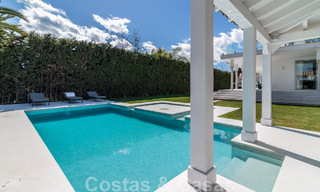 Unique luxury villa for sale in a modern, Andalusian architectural style, with sea views, within walking distance of Puerto Banus, Marbella 45907 